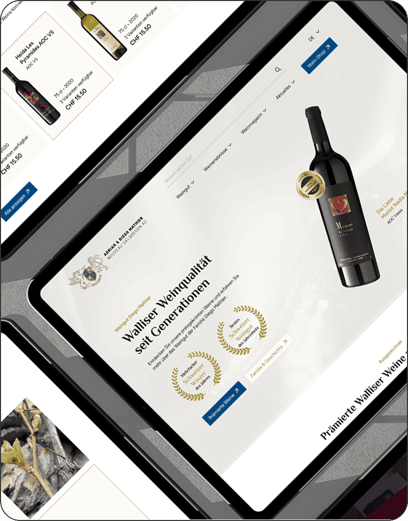 Tablet mit der Darstellung einer Weinkellerei-Website mit Bildern von Weinflaschen, Auszeichnungen, Produktpreisen in CHF und Navigationslinks.