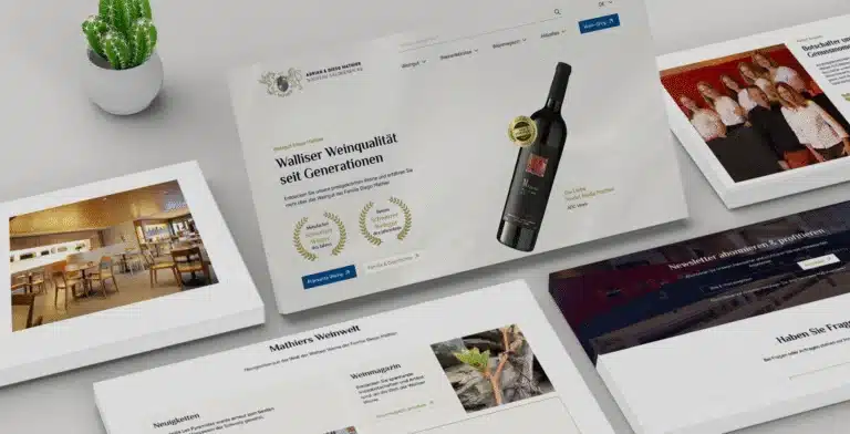 Website-Mockups von mathier.com mit Weinflasche und Auszeichnungen